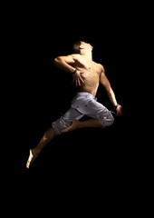 stylish and young modern style dancer is posing..