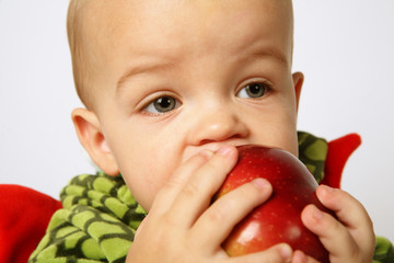 Eating red apple.