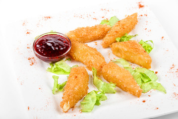 Baked cheese with cranberries sauce