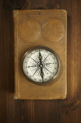 compass and old atlas
