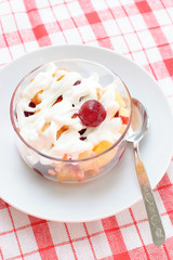 Fruit salad with whipped cream