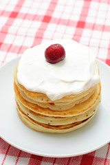 pancakes with cream and cherries