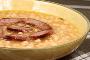 white beans with sausage close up