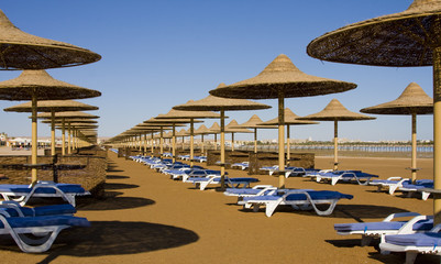 Beach on a sunny day. Hurghada city in Egypt.