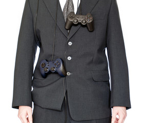 Businessman with game pad isolated on white background © difught