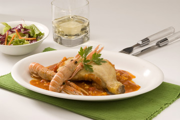 Spanish cuisine. Chicken and langoustines.
