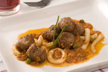 Spanish cuisine. Cuttlefish and meatballs.