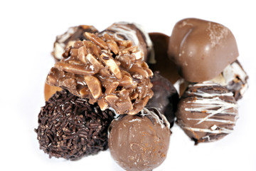 Handmade chocolates on white