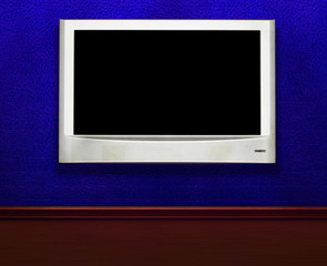 blue wall with  LCD tv
