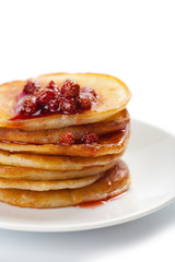 sweet pancakes with strawberry jam isolated