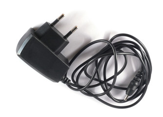 Cell phone battery charger isolated on white