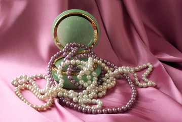 pearls in green box