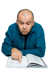 Adult man reading a book