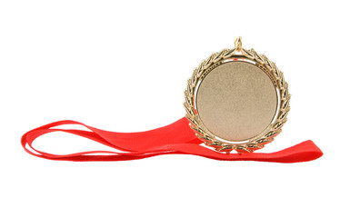Gold medal with red ribbon isolated on white