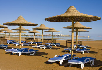 Beach on a sunny day. Hurghada city in Egypt.