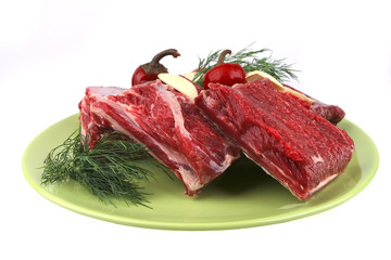 beef rib's on dish with greenery