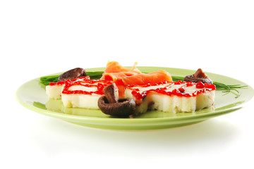 salmon slice with mash on green