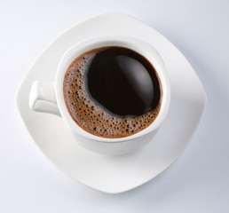 White cup of black coffee