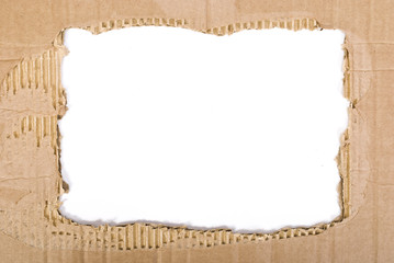 Corrugated cardboard sheet torn