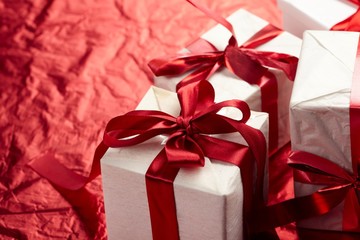 Beautiful gift boxes on the red background