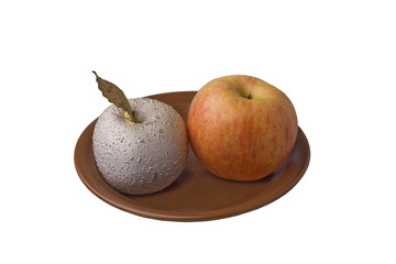 red yellow and silver apples on brown plate