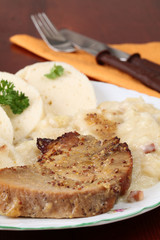 Pork with dumplings and sauerkraut