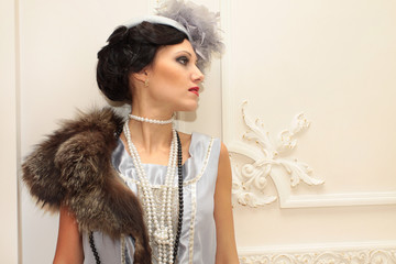 Retro styled fashion portrait of a professional model