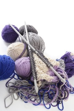 knitting tools with wool thread balls