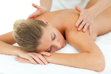 Fototapeta na wymiar Positive woman enjoying a massage
