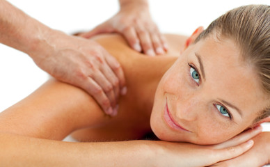Smiling woman enjoying a massage