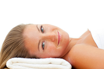 Obraz na płótnie Canvas Portrait of charming woman relaxing after a spa treatment
