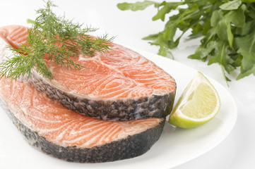 Raw salmon steak with herbs
