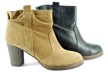 woman brown and black short boots