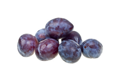 Fresh natural plums isolated on white