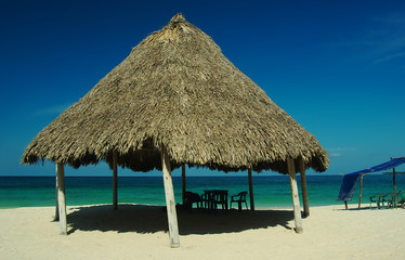 Shadow giving hut at Playa Blanca, Colombia