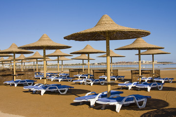 Beach on a sunny day. Hurghada city in Egypt.
