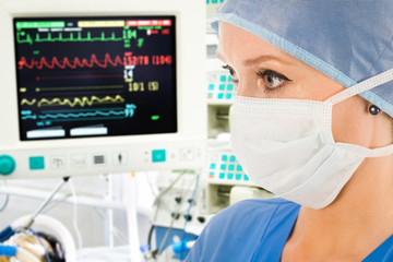 Doctor with surveillance monitor - 20312601