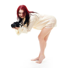 Attractive woman photographer posing