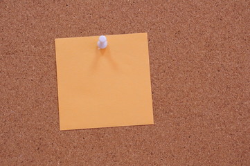 Coloured memory paper - reminder on a noticeboard.