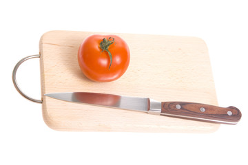 Tomatoes on cutting board