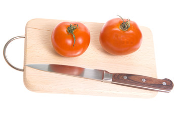 Tomatoes on cutting board