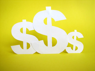 us dollar sign cut from paper