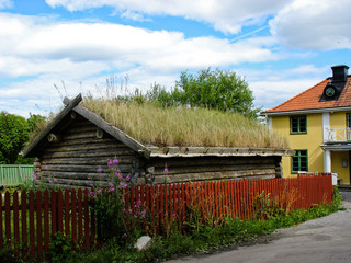 Fototapeta na wymiar Drewniane domy na ulicach Sigtuna (Szwecja)