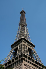 view of the Tour Eiffel (Paris, France) against bright blue sky
