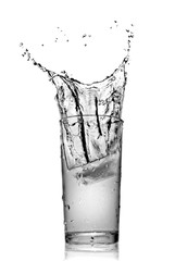 water splash in glass isolated on white