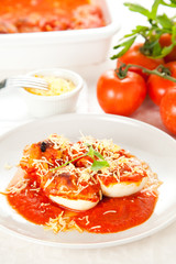 stuffed eggs with tomato cheese