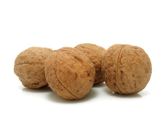 Walnuts on the white background