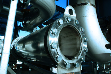 Pipes, tubes, machinery and steam turbine at a power plant © Andrei Merkulov