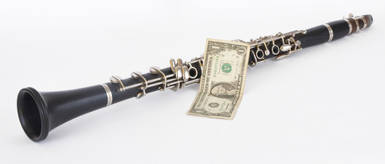 Naklejka premium Clarinet and dollar