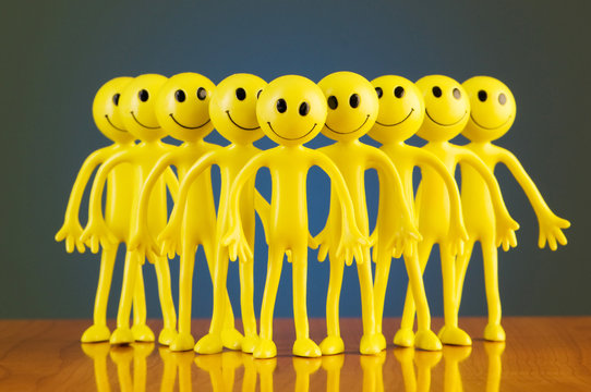 Leadership concept with smilies against gradient background